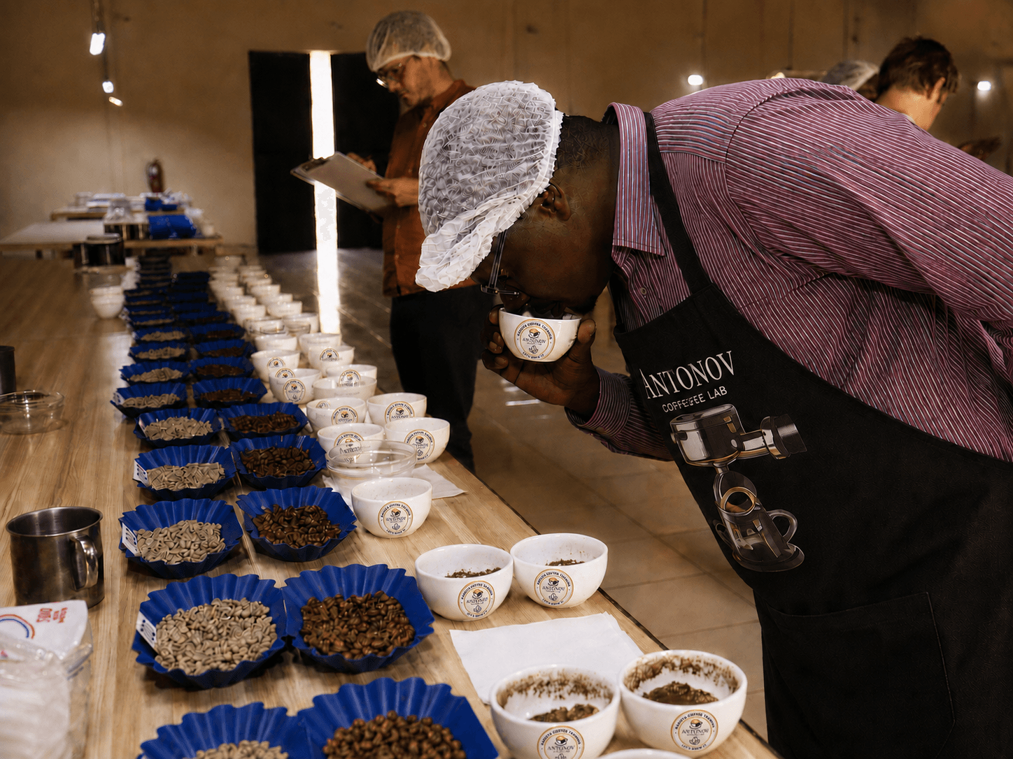 Students cupping and tasting coffee at Antonov Coffee Lab